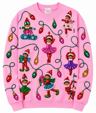 A pink crewneck sweatshirt covered in sequined Christmas elf and light bulb motifs, shown flat against a white background.