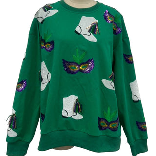 Green sweater with Mardi Gras designs and fringe sequin boots