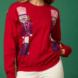 red nutcracker sequin sweater