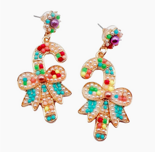 Colorful candy cane-shaped earrings with bow details on a white background