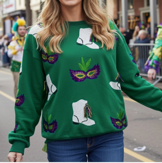 green sweater with sequin Mardi Gras-boots and sequin fringe